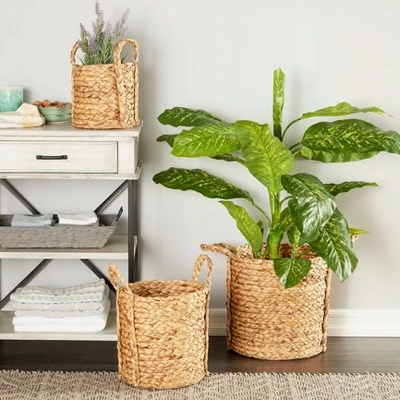 Olivia & May Set of 3 Seagrass Wicker Basket Planters with Handles Natural - Olivia & May 3 Olivia & May Set of 3 Seagrass Wicker Basket Planters with Handles Natural - Olivia & May