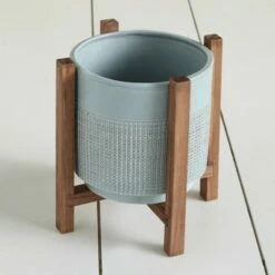 The Lakeside Collection Lakeside Ceramic Planter on Wood Stand - Indoor/Outdoor Decorative Pot