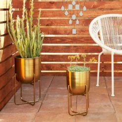 Set of 2 Contemporary Metal Planters in Stands - Olivia & May Metallic Gold