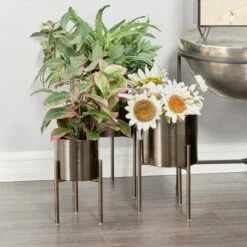 Olivia & May 18" Contemporary Metal Planters with Stands Black/Silver - Olivia & May