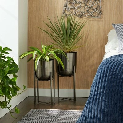 CosmoLiving by Cosmopolitan Set of 2 11" x 11" x 22"/10" x 10" x 19" Contemporary Iron Planters with Stands Black 3 CosmoLiving by Cosmopolitan Set of 2 11" x 11" x 22"/10" x 10" x 19" Contemporary Iron Planters with Stands Black