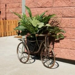 Sunnydaze Decor Sunnydaze Indoor/Outdoor Rustic Metal Tricycle Standing Planter Basket for Front Yard, Porch, Garden, or in the Home - 12" - Brown